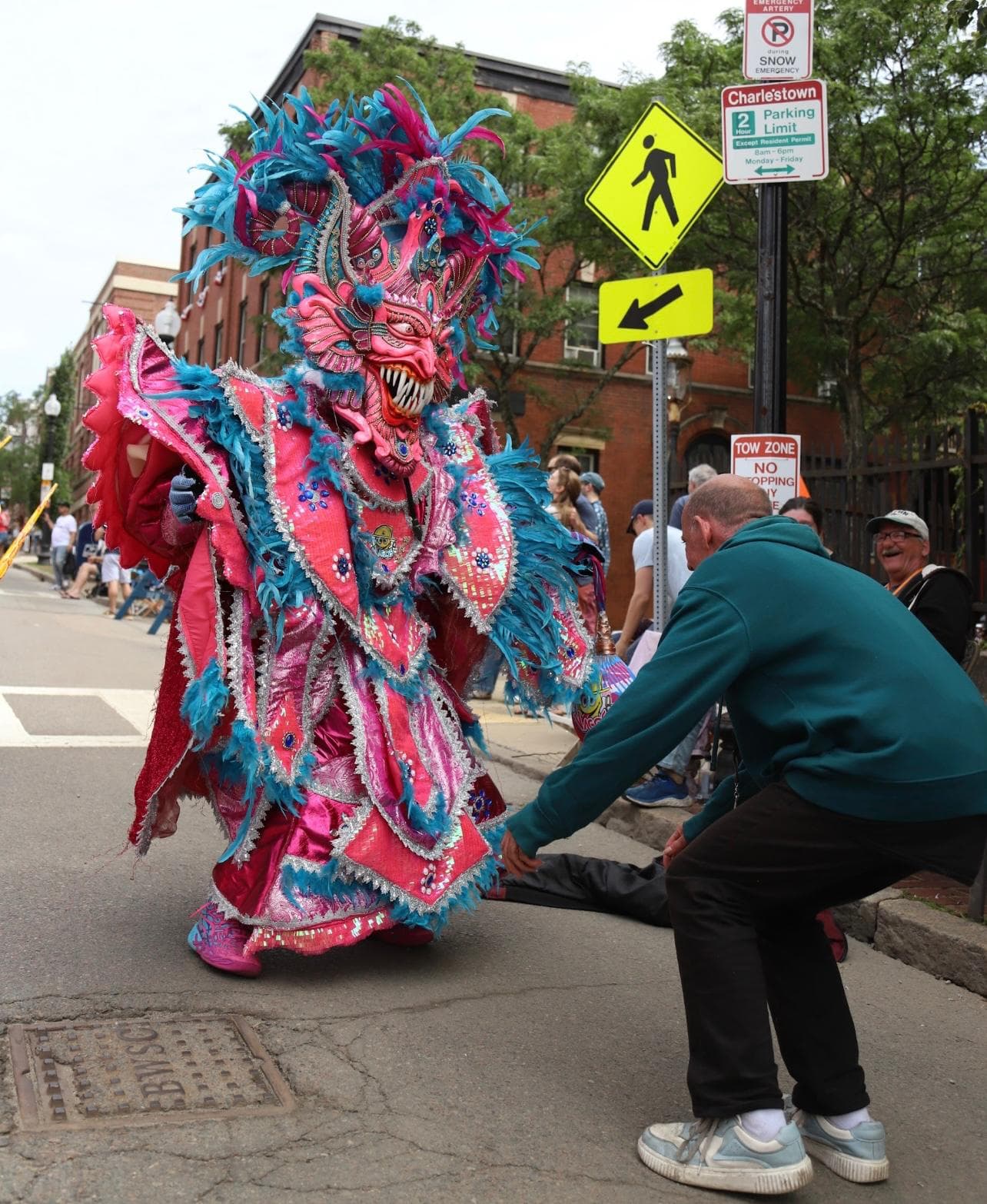 ACM Diablo Cojuelo in a richly decorated pink and blue horned costume